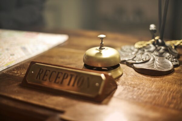 A bell on the receptionist's desk.