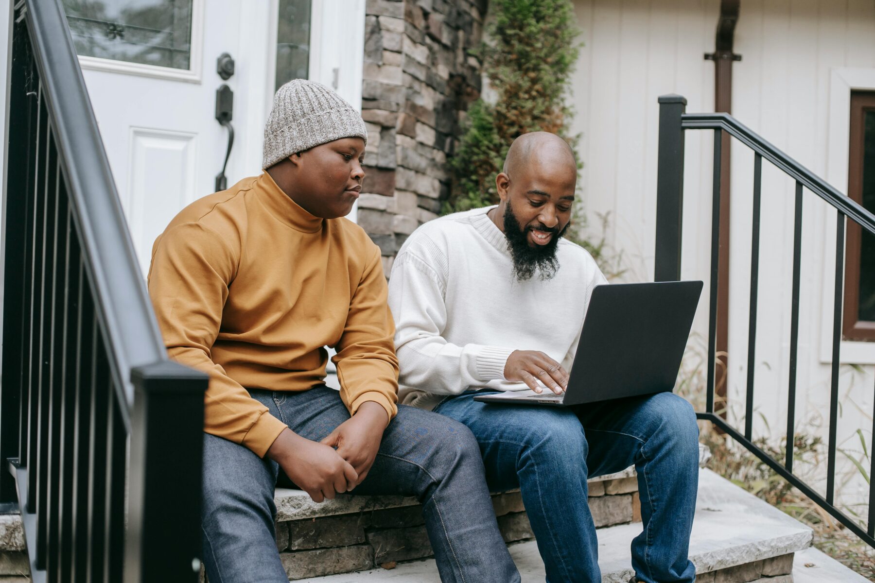 A social worker helping a client access resources. 